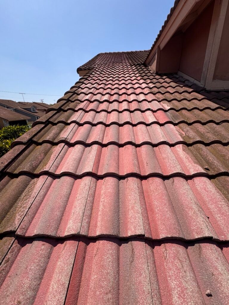 Cleaned strip on tile roof during PJ Solar pressure washing